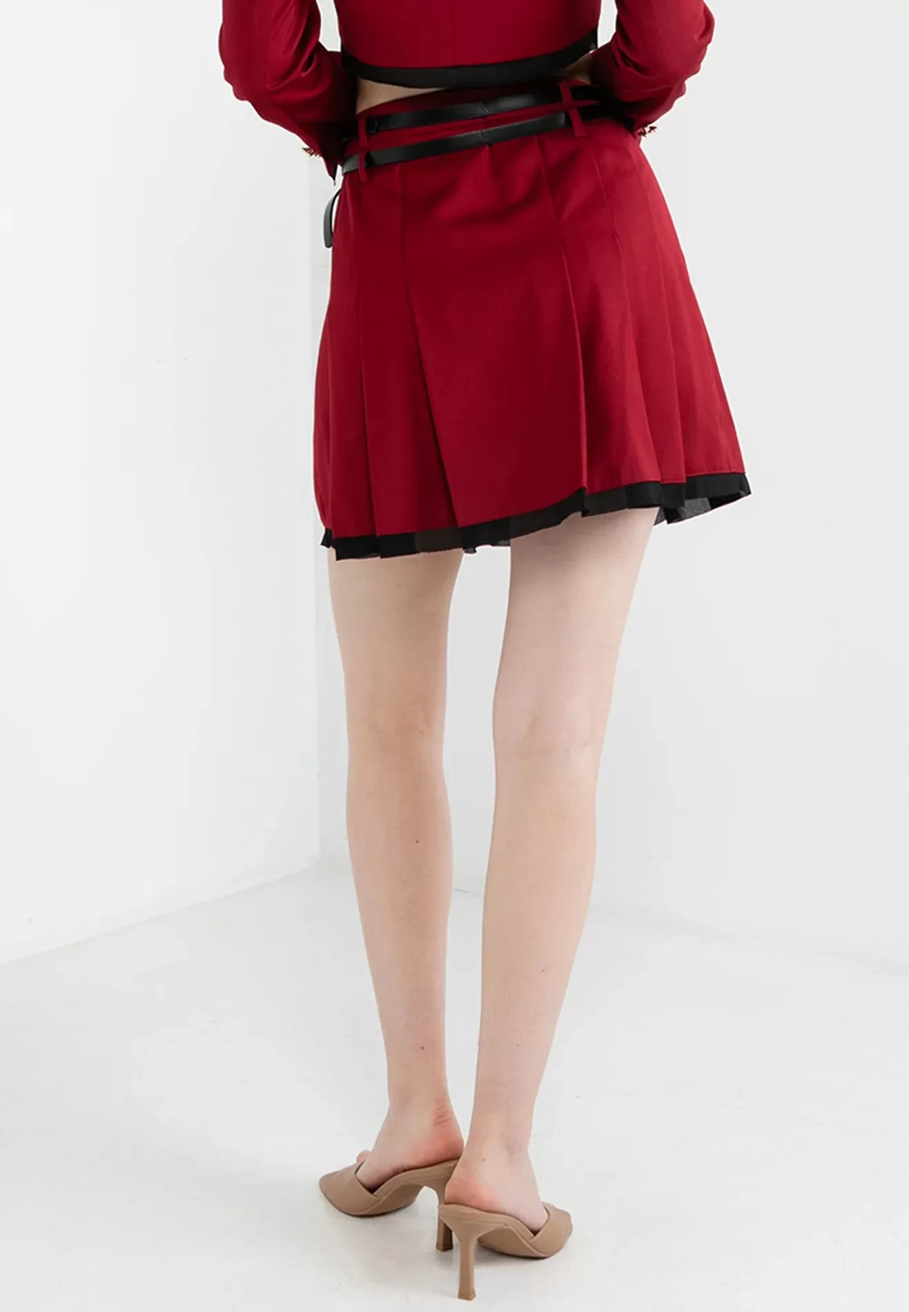 ELLE Apparel Double Belted Pleated Mini Skirt