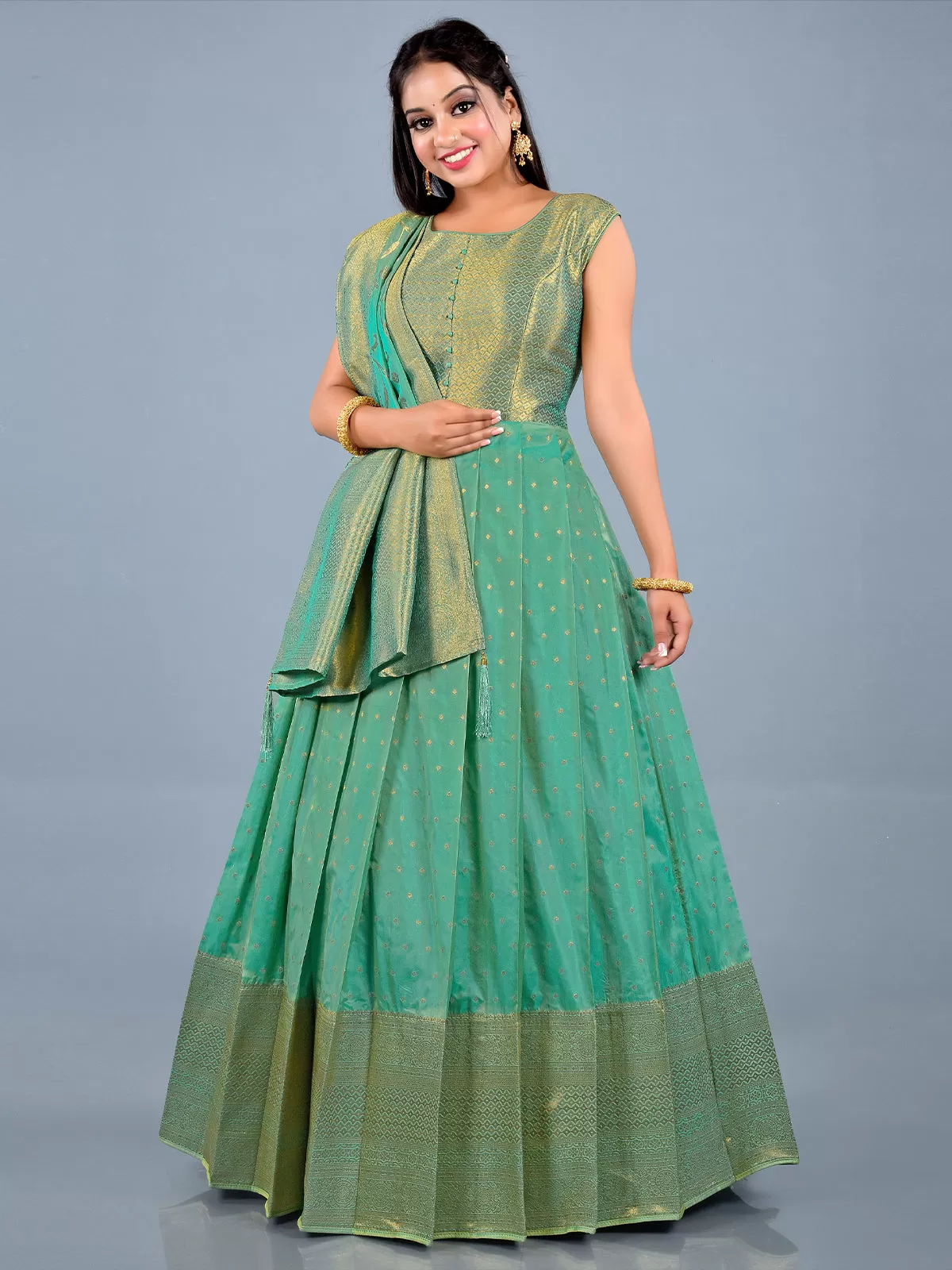 Odette Women Light Green Banarasi Silk Woven Stitched Gown